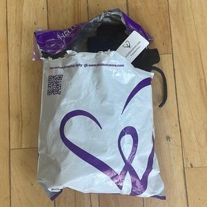 Never even worn, tags still , no damage, perfect condition